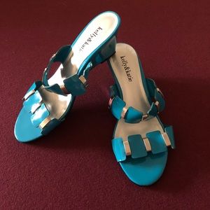 Kelly & Katie Wilde turquoise colored sandal.